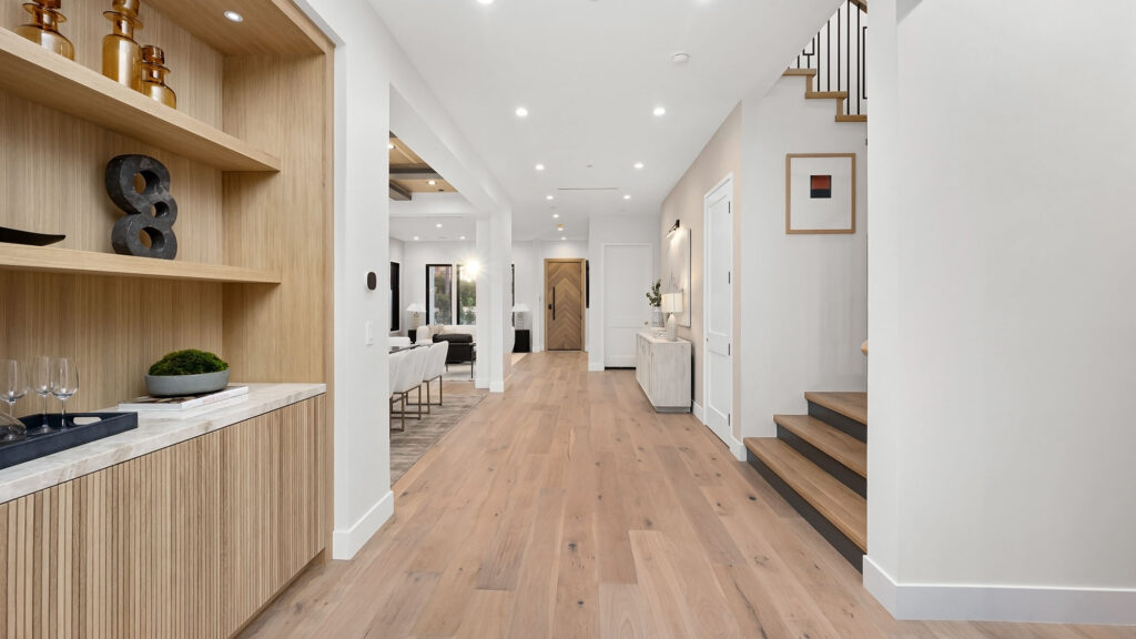Open concept home with consistent vinyl flooring